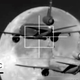Illustration for article titled Incredible video of an air tanker refueling a tanker against a full moon